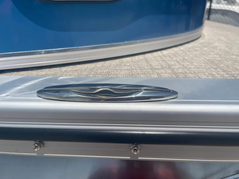 Slide: The Image of Close-up of a blue Avalon LSZ Rear Fish 2024 with silver detailing. - 39