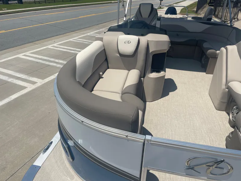 Slide: The Image of The image shows the deck of a 2024 Avalon LSZ Rear Fish with comfortable seating and sleek design. - 13