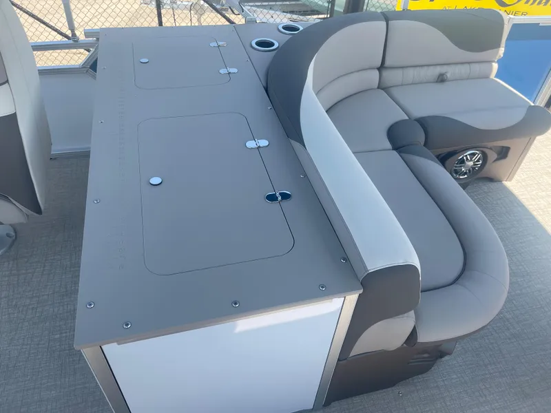 Slide: The Image of The image shows the interior of a 2024 Avalon LSZ Rear Fish with a gray bench and table. - 30