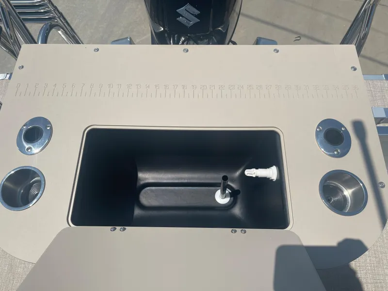 Slide: The Image of The image shows a fishing accessory on a 2024 Avalon LSZ Rear Fish boat. - 25