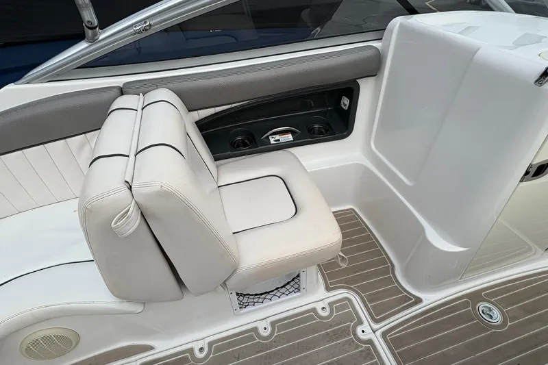 Slide: The Image of 2008 Yamaha Boats AR230 HO interior seating with cup holders and storage. - 13