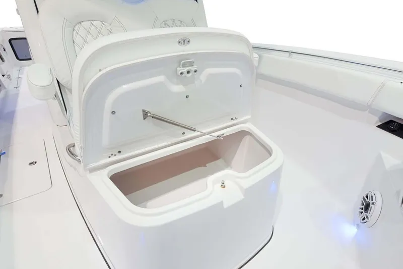 Slide: The Image of Manufacturer Provided Image: 2025 Sportsman Open 322 Center Console boat storage compartment open. - 23