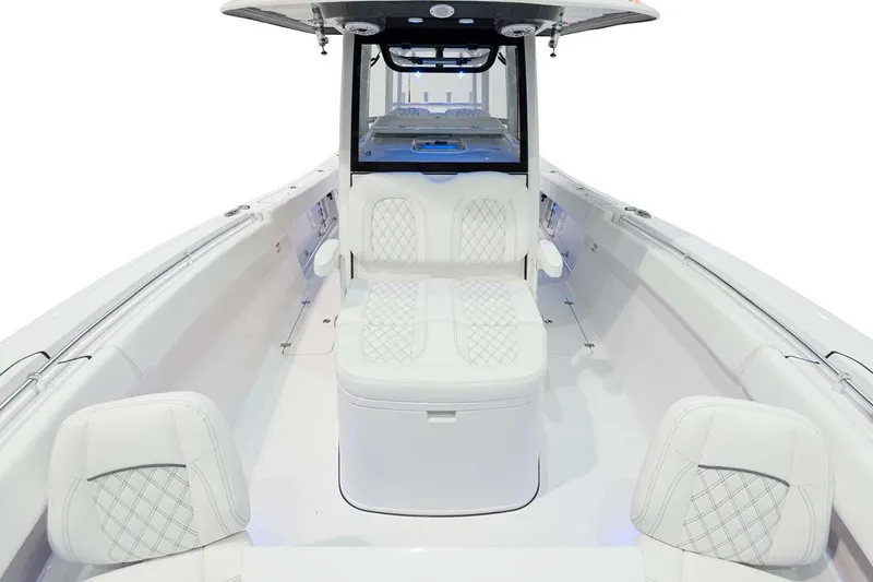 Slide: The Image of Manufacturer Provided Image: 2025 Sportsman Open 322 Center Console boat interior with white seating and modern design. - 17