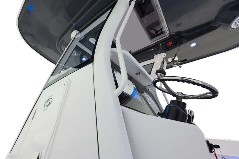 Slide: The Image of Manufacturer Provided Image: 2025 Sportsman Open 322 Center Console, sleek helm design, modern controls, and spacious layout. - 21