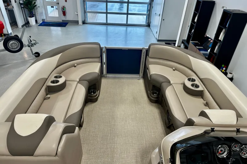 Slide: The Image of Luxurious interior of 2022 Avalon LSZ 2285 CR pontoon boat with plush seating and cup holders. - 17