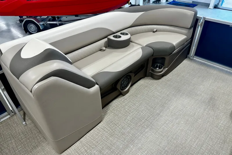 Slide: The Image of 2022 Avalon LSZ 2285 CR pontoon boat seating with cup holders and modern design. - 20
