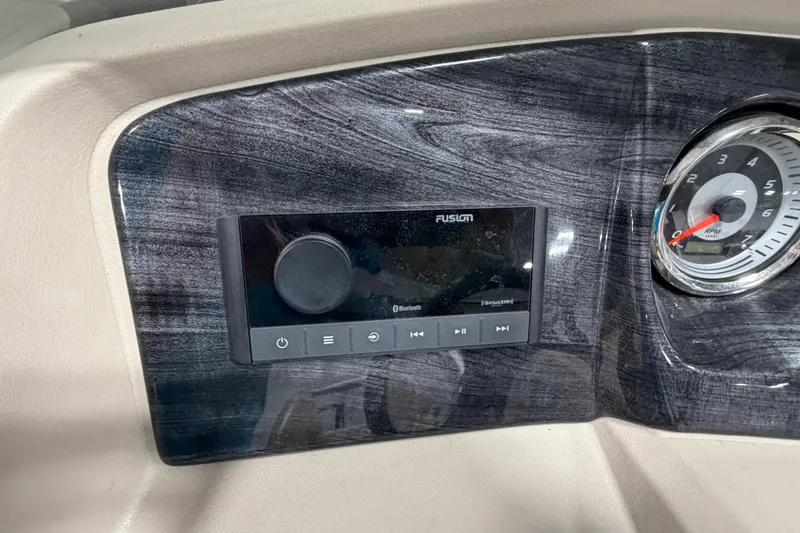Slide: The Image of Dashboard of 2022 Avalon LSZ 2285 CR with Fusion audio system and RPM gauge. - 13