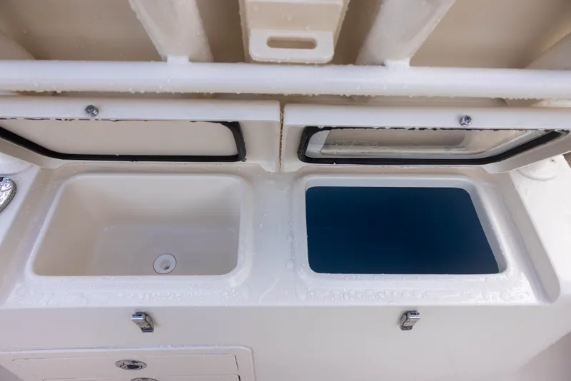 Slide: The Image of The image shows two compartments on a boat, one with a blue interior. - 7