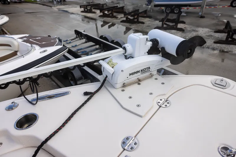 Slide: The Image of A 2021 Grady-White Canyon 271 with a Minn Kota trolling motor on the deck. - 16