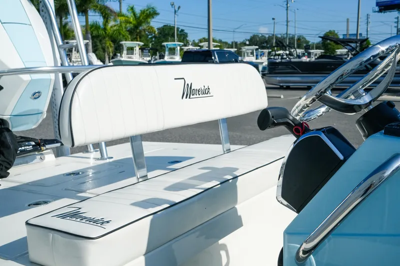 Slide: The Image of 2027 Maverick Mirage 18 HPX-V boat interior with white seating and steering wheel. - 29