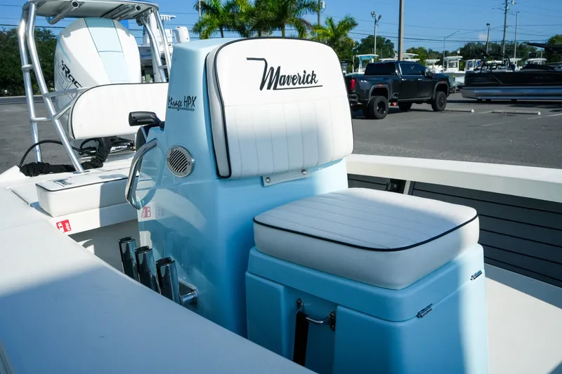 Slide: The Image of 2027 Maverick Mirage 18 HPX-V boat interior with white seating and sleek design. - 26