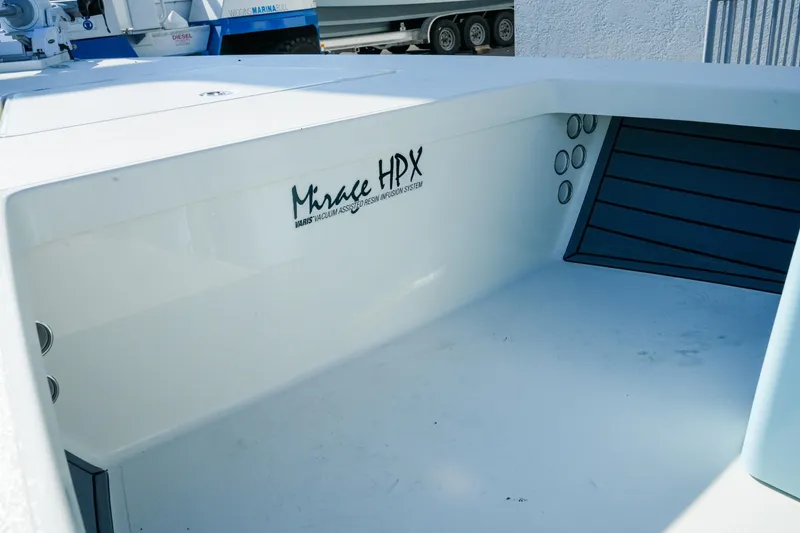 Slide: The Image of 2027 Maverick Mirage 18 HPX-V boat interior with VARIS technology, showcasing sleek design. - 18