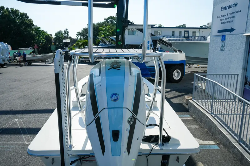 Slide: The Image of 2027 Maverick Mirage 18 HPX-V boat displayed at a dealership entrance. - 11