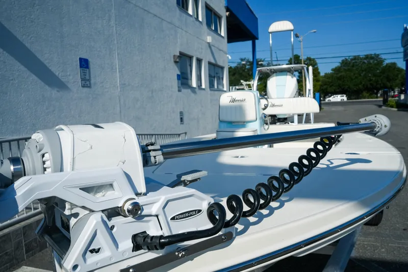 Slide: The Image of 2027 Maverick Mirage 18 HPX-V boat with Power-Pole anchor system, parked outdoors. - 4