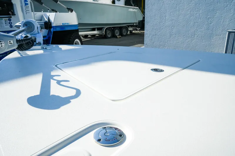 Slide: The Image of 2027 Maverick Mirage 18 HPX-V boat deck with sleek design and modern features. - 20