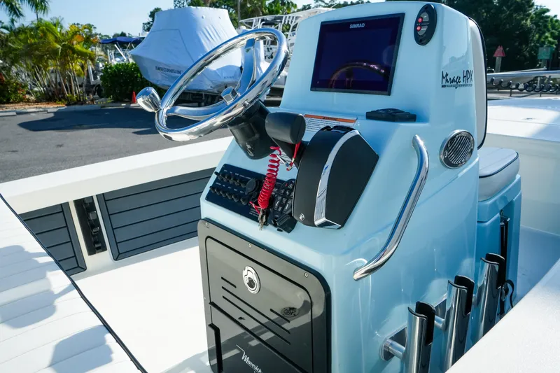Slide: The Image of 2027 Maverick Mirage 18 HPX-V boat console with steering wheel and navigation display. - 30