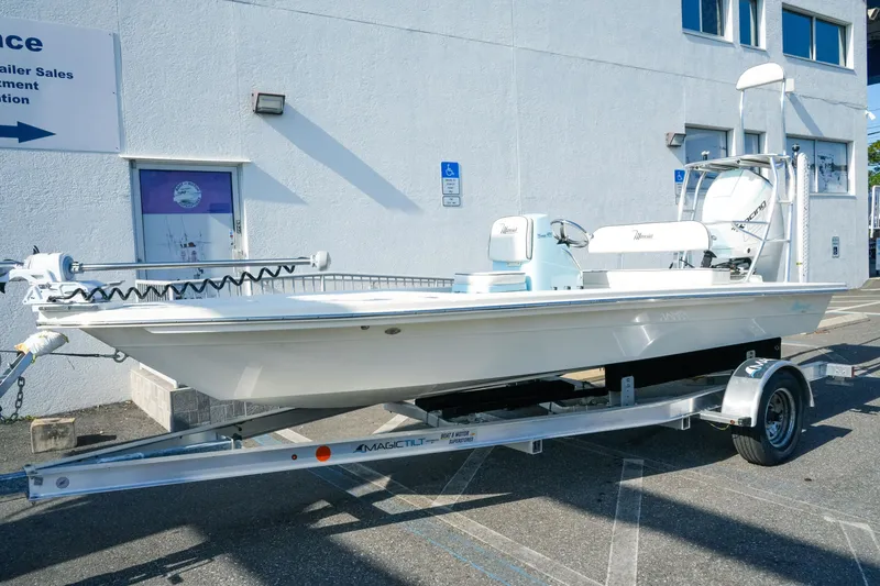 Slide: The Image of 2027 Maverick Mirage 18 HPX-V boat on trailer outside dealership. - 2