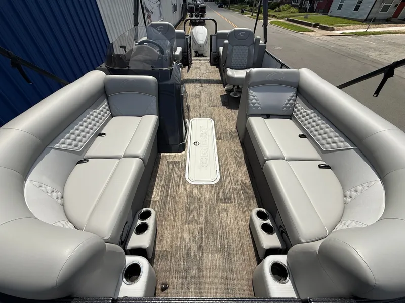 Slide: The Image of 2022 Crest Classic Platinum 220 SLC with luxurious gray upholstered seating and modern design. - 2