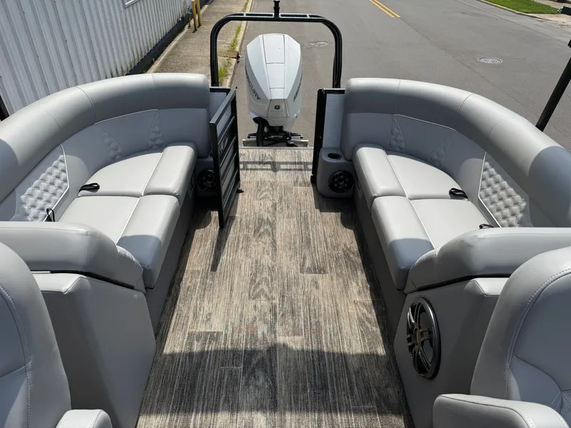 Slide: The Image of The image shows the interior of a 2022 Crest Classic Platinum 220 SLC with gray seating. - 3