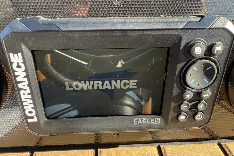 Slide: The Image of Lowrance Eagle 5 fishfinder on 2026 Premier 230 SunSation RF boat dashboard. - 11