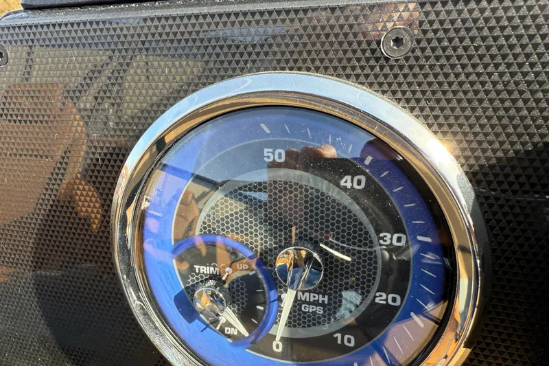 Slide: The Image of Close-up of 2026 Premier 230 SunSation RF speedometer with GPS and trim indicators. - 16
