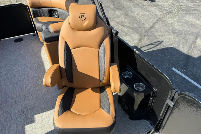 Slide: The Image of Luxurious seating on 2026 Premier 230 SunSation RF boat with cup holders and stylish design. - 8