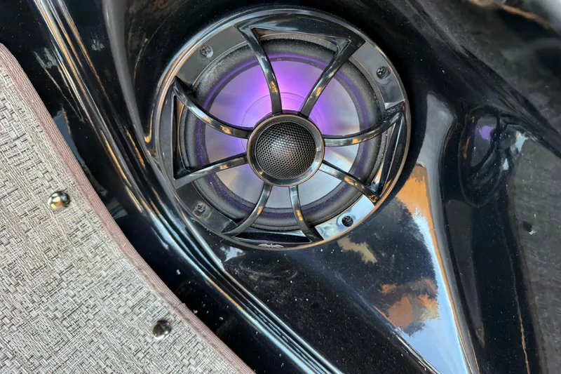 Slide: The Image of Speaker with purple LED lights on 2026 Premier 230 SunSation RF boat. - 10
