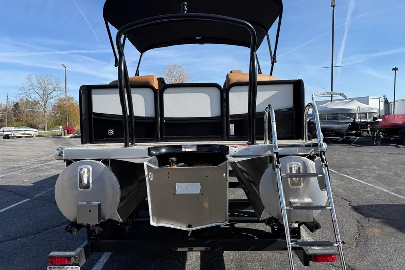 Slide: The Image of 2026 Premier 230 SunSation RF pontoon boat rear view with ladder and seating. - 32