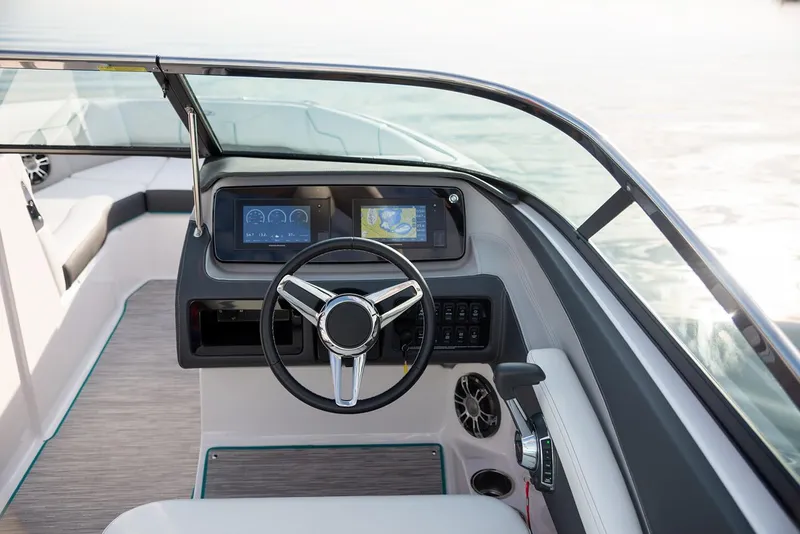 Slide: The Image of Manufacturer Provided Image: 2026 Regal LS4 boat dashboard with modern steering and digital displays. - 17