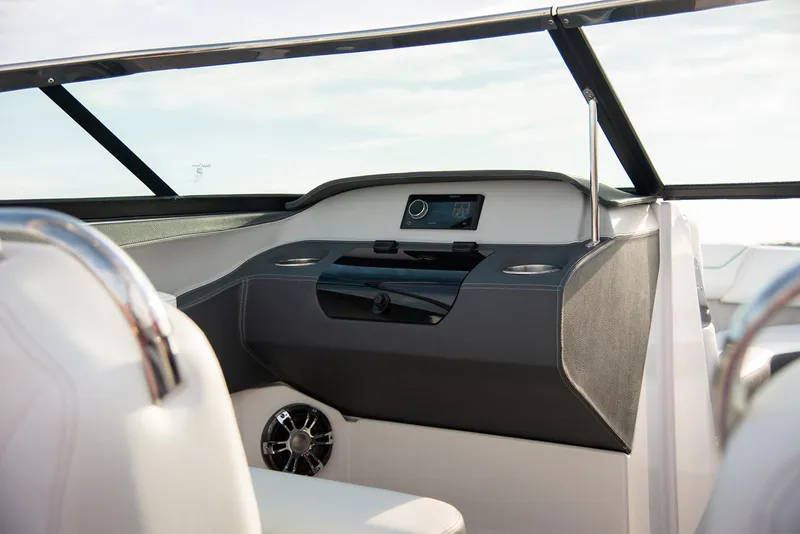 Slide: The Image of Manufacturer Provided Image: Interior of 2026 Regal LS4 boat, featuring sleek dashboard and modern controls. - 18