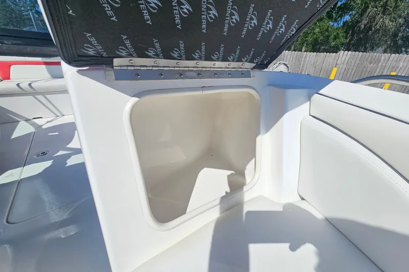 Slide: The Image of Open storage compartment on a 2015 Monterey 197 Blackfin boat, showcasing interior space. - 18
