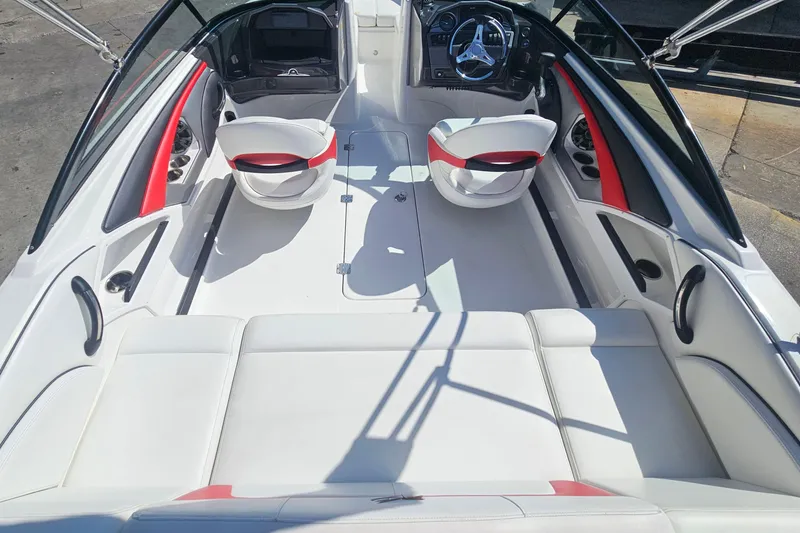 Slide: The Image of 2015 Monterey 197 Blackfin boat interior with white and red seating, sleek design. - 21