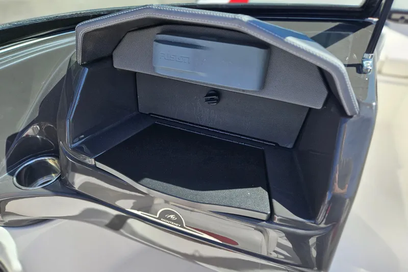 Slide: The Image of Open glove compartment in a 2015 Monterey 197 Blackfin boat. - 11
