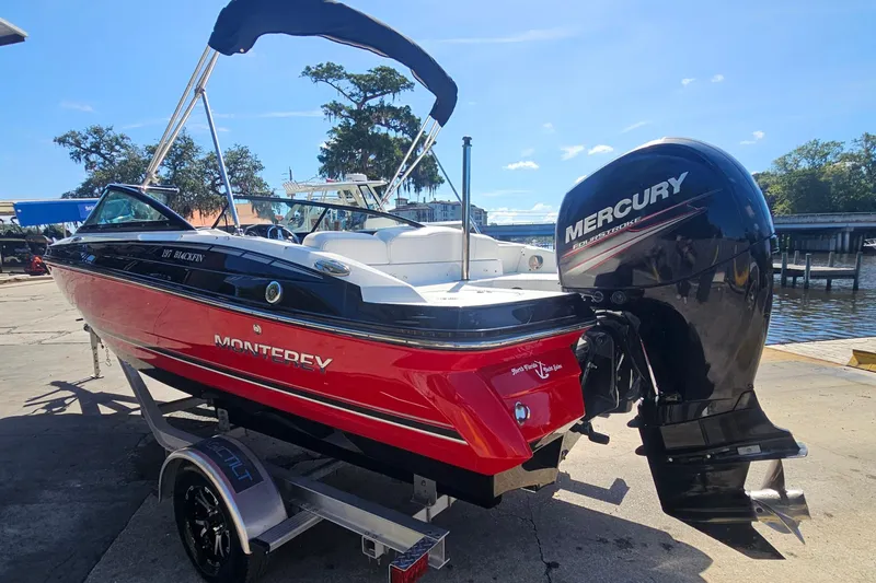 Slide: The Image of 2015 Monterey 197 Blackfin boat with Mercury outboard motor on trailer. - 4