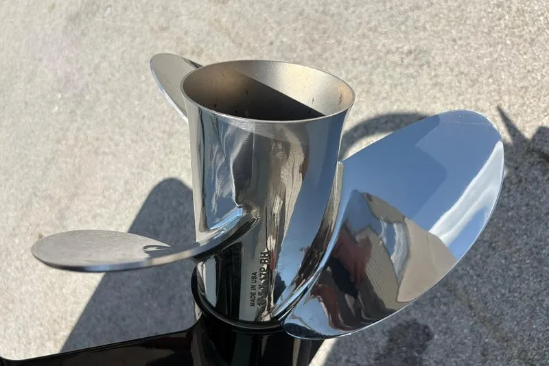 Slide: The Image of Close-up of a shiny boat propeller from a 2022 Boston Whaler 190 Montauk. - 17