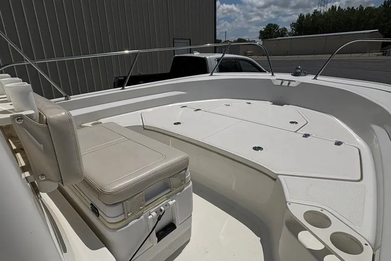 Slide: The Image of 2022 Boston Whaler 190 Montauk boat interior with seating and storage compartments. - 9