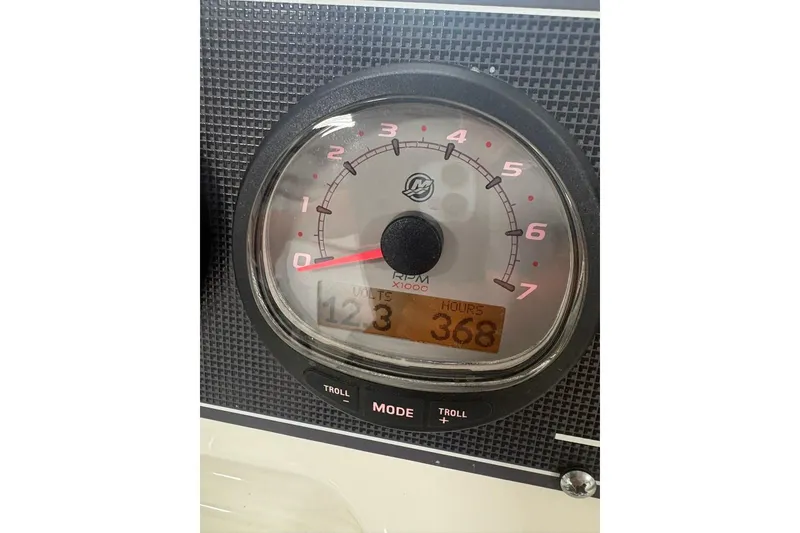 Slide: The Image of Close-up of a 2022 Boston Whaler 190 Montauk tachometer showing 368 hours. - 16