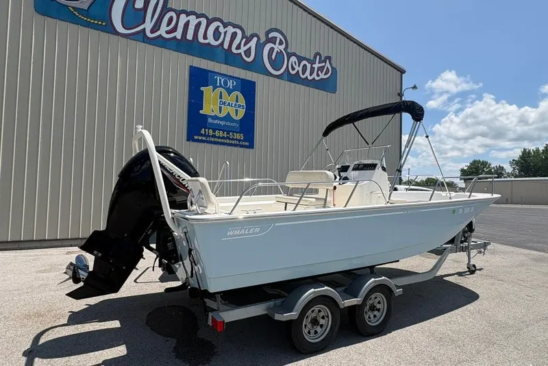 Slide: The Image of 2022 Boston Whaler 190 Montauk boat on trailer at Clemons Boats dealership. - 4