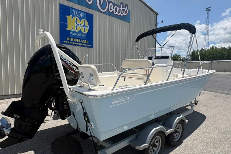 Slide: The Image of 2022 Boston Whaler 190 Montauk boat with Mercury engine on trailer. - 5