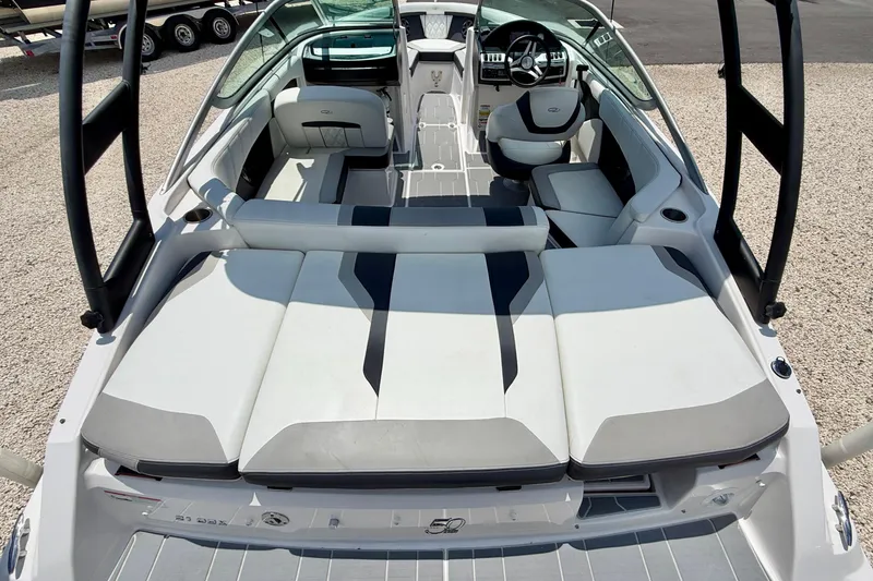 Slide: The Image of 2020 Regal 21 OBX boat interior with spacious seating and modern design. - 25