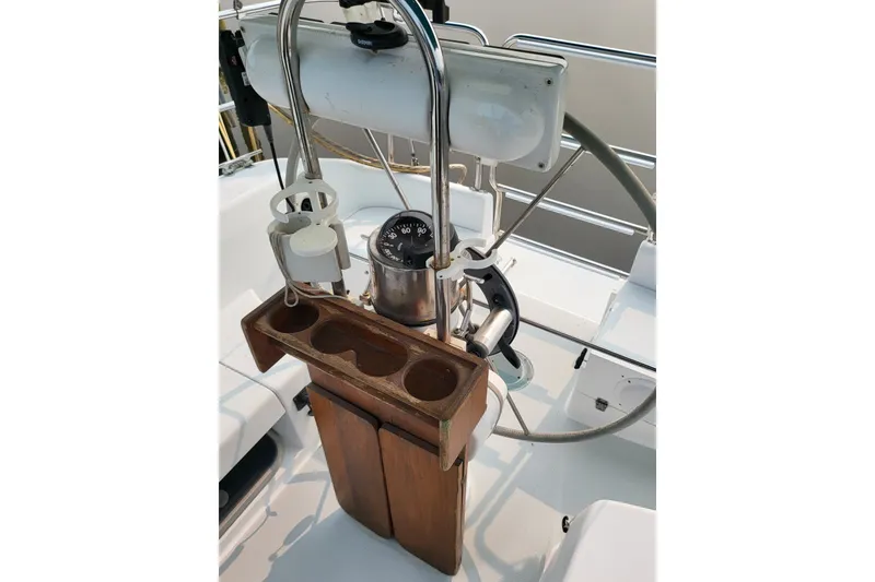 Slide: The Image of Cockpit of 1997 Catalina 36 MkII sailboat with compass and wooden cup holder. - 5