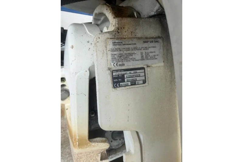 Slide: The Image of Close-up of a 2009 Premier 240 SunSpree engine label with specifications. - 9