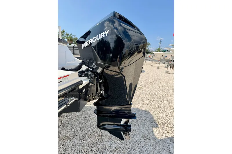 Slide: The Image of 2022 Sea Ray SPX 230 Outboard with Mercury engine on gravel lot. - 33