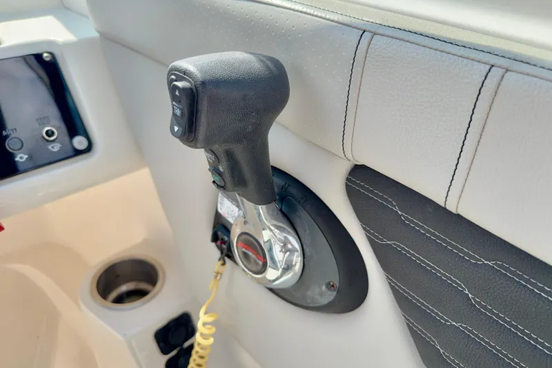 Slide: The Image of Throttle control of 2022 Sea Ray SPX 230 Outboard boat, featuring modern design and functionality. - 18