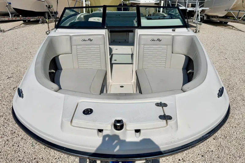 Slide: The Image of 2022 Sea Ray SPX 230 Outboard boat with spacious seating and sleek design. - 8