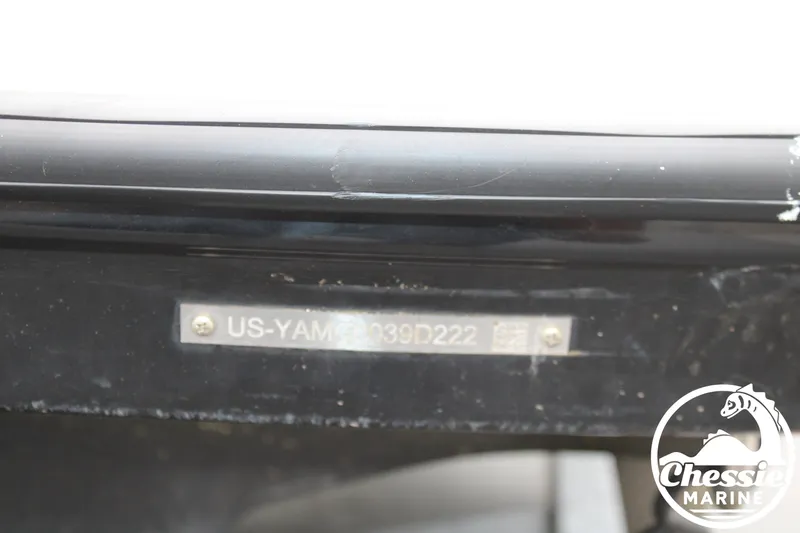 Slide: The Image of Close-up of a boat hull with serial number and Chessie Marine logo. - 23