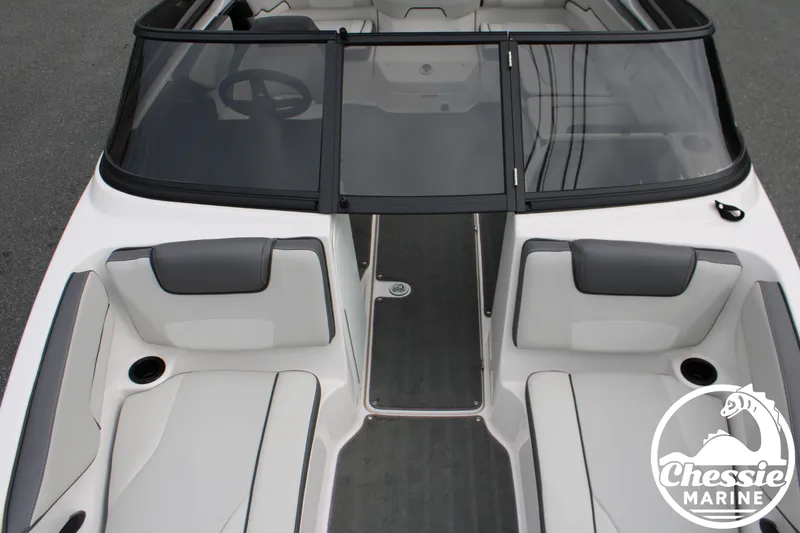 Slide: The Image of The image shows the cockpit of a 2022 Yamaha AR190 boat with gray and white seating. - 21