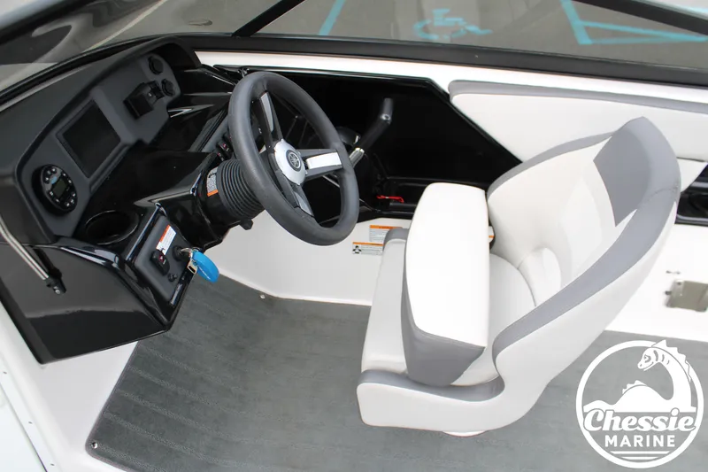 Slide: The Image of The image shows the cockpit of a 2022 Yamaha AR190 boat with a modern helm. - 14