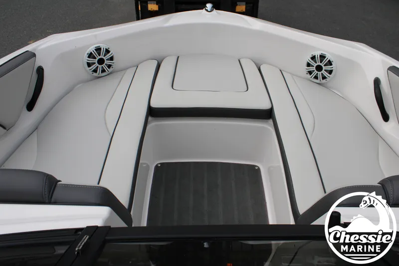 Slide: The Image of The image shows the bow area of a 2022 Yamaha AR190 boat with gray upholstery and speakers. - 16
