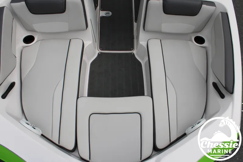 Slide: The Image of The image shows the interior of a 2022 Yamaha AR190 boat with gray and white seating. - 20